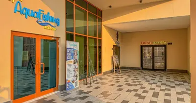 a building with an entrance to a fast food restaurant at Luxury Studio on Palm Jumeirah Beach Access in Dubai