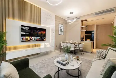 a living room with a couch and a table at Vida Dubai Mall! 2 Bedroom with Burj Khalifa View! Direct Access to Dubai Mall in Dubai