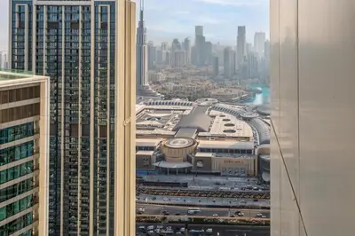 a view of a city from the top of a building at King 2 Bedroom With Burj Khalifa View & Dubai Mall Access in Dubai