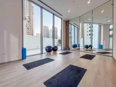 a yoga room with a lot of yoga mats at Frank Porter - Liv Marina in Dubai