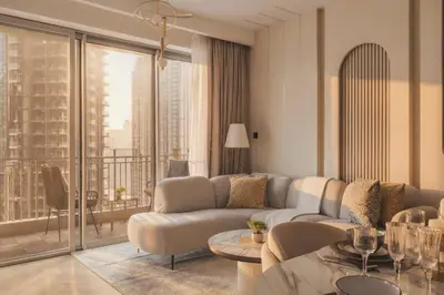 a living room with a couch and a table at Fountain & Opera Views 1 Bedroom Apartment with Balcony in Dubai