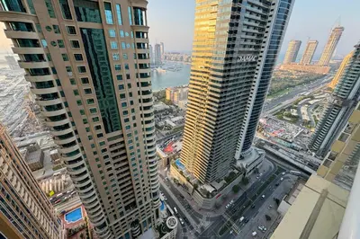 an aerial view of a city with tall buildings at Spacious 2BR in Sulafa Tower - Dubai Marina in Dubai