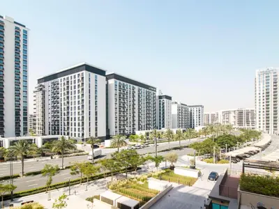 a view of a city with tall buildings at Modern & Stylish Stay in 1BR Socio Dubai Hills in Dubai