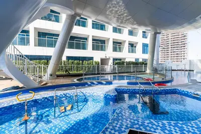 a large swimming pool on a cruise ship at Limited Time l Private Pool I Elegance l Prime Location in Dubai