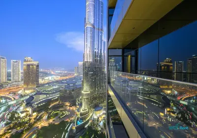 a view of a city with a tall skyscraper at FULL Burj Khalifa View Luxe 3BR in Address Opera in Dubai