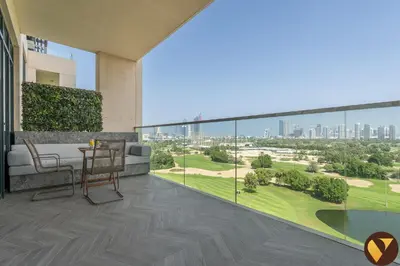 a balcony with a view of a city at Vogue Emirates Hills, Vida The Hills Residence near Marina and JBR, Three Bedroom Apartment with Balcony and Golf Club View, Access to all Amenities in Dubai