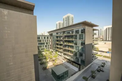 arial view of a building in a city at Spacious Two Bedroom with Maids room Near City Mall in Dubai