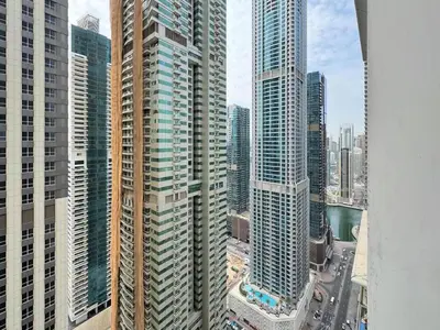 an aerial view of a city with tall buildings at Bright 1BR Apartment in Elite Residence Marina in Dubai