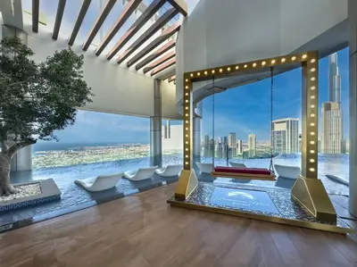 a living room with a view of the water at Morden 2BR With Full sea view -High floor in Dubai