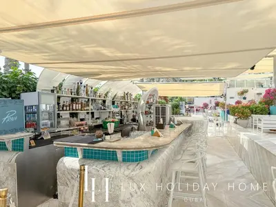 a rendering of a bar in a shopping mall at LUX The Five Palm Jumeirah Suite in Dubai