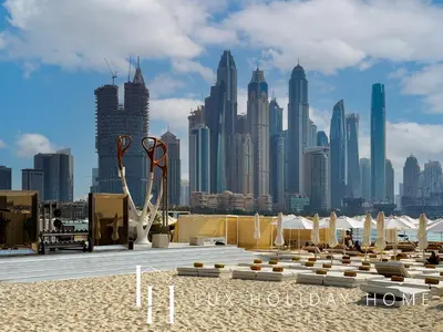 a view of a city skyline with buildings at LUX The Five Palm Jumeirah Suite in Dubai