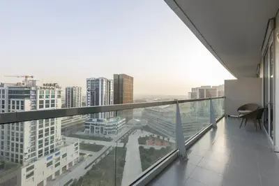 an empty balcony with a view of a city at Stylish 2BR Oasis in Business Bay with Pool & Gym in Dubai