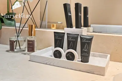 a set of three products in a white box on a counter at MarvelStay - Beach 5 mins - Fits 3 - Pool-Gym-Sauna - Marina in Dubai