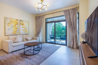 a living room with a couch and a table at Exclusive 2BR in Rahaal 2, Madinat Jumeirah Living in Dubai