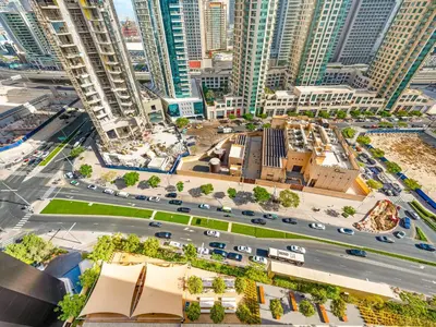 an aerial view of a city with tall buildings at NEW 1BR in DOWNTOWN I 100m Walk to DUBAI MALL I Amazing POOL with Burj View in Dubai