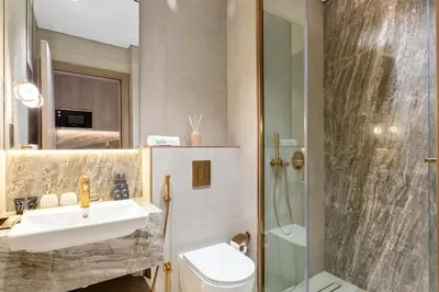 a bathroom with a sink and a shower at Stylish Comfort Studio in Westwood Grande in Dubai
