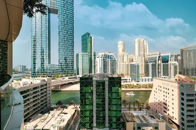 a view of a city with a river and buildings at Luxury 5BR Marina View w Private Pool KG1004 in Dubai