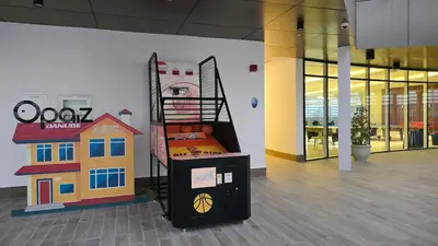 a room with a bed with a toy house on it at Luxury 2 BR in Al Barsha Opalz Danube by dpie A312 in Dubai