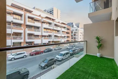 a balcony with a view of a parking lot at Luxury 4 BHK Villa in JVC by dPie in Dubai