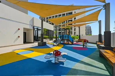 a play area with a playground on a building at Estudio Sultan en Dubái por beBalmy in Dubai