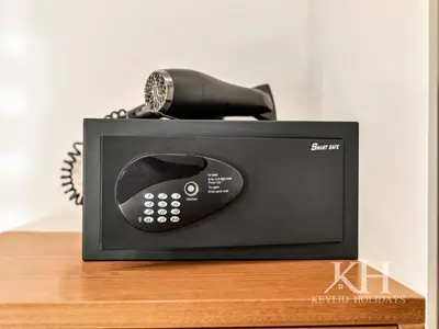 a black phone sitting on top of a counter at keylid-2BR-Address Opera-5 mins walk to Dubai Mall in Dubai
