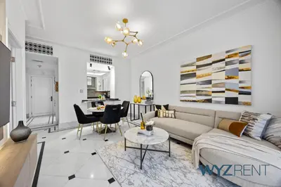 a living room with a couch and a table at Arabian Elegance 1BR Zanzabeel 1 Burj Khalifa View in Dubai