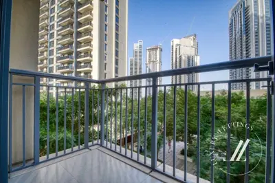 a balcony with a view of a city at Luxury 2BR Harbour Views Tower 2 Creek Harbour Dubai in Dubai