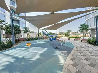 a playground with a swing in a building at Vacationer l Stunning 1 Bed l Private Beach l near Downtown in Dubai