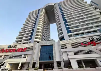 a view of the apartment building at Vacationer I Premium Studio I Pool & Gym Access I Near Miracle Garden I Opalz Tower 2 in Dubai