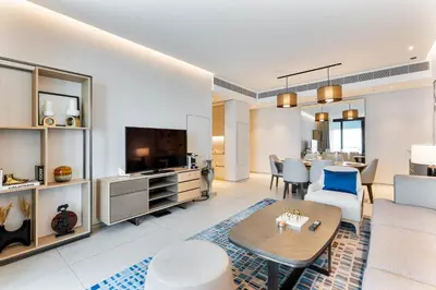 a living room with a couch and a table at Luxury 3 bedroom Apartment Full Sea & Ain Dubai View Address JBR in Dubai