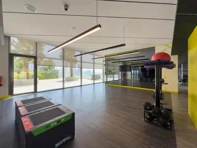 a room with a bowling alley with a machine in it at GuestReady - 2BR l City Chic in the Sky in Dubai