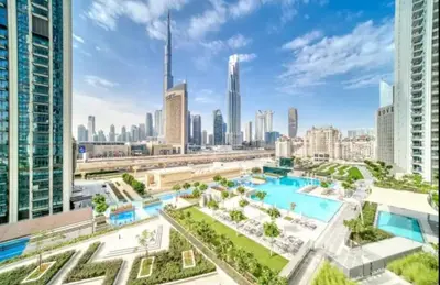 an aerial view of a city with buildings at Downtown with Direct Access Dubai Mall & Burj Khalifa in Dubai