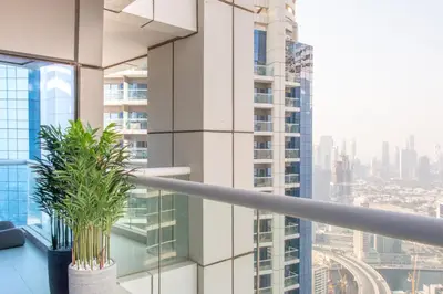 a balcony in a building with a potted plant at Old Hollywood Glamour by Namuve - Damac Paramount in Dubai