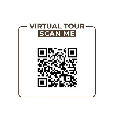 a black and white square with a virtual tour scan me sign at BLVD Luxury 2BHK with Private Pool Near Circle Mall in Dubai
