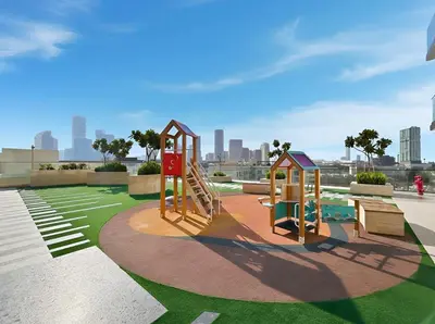a playground with a slide in a park at BLVD Luxury 2BHK with Private Pool Near Circle Mall in Dubai