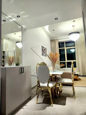 a dining room with a table and chairs at Marina Residence tower A in Dubai