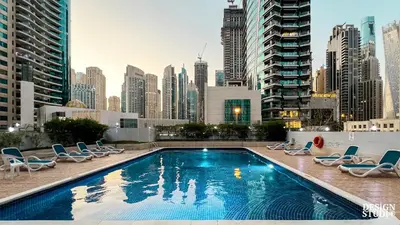 a large swimming pool on the roof of a building at MARINA DIAMOND 6 by Design Studio in Dubai