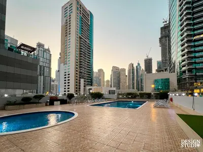 a view of a city skyline with a swimming pool at MARINA DIAMOND 6 by Design Studio in Dubai
