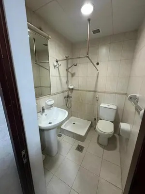 a bathroom with a toilet and a sink at Marina Princess Tower Dubai Apartment in Dubai