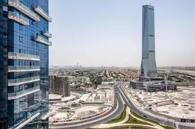 a view of a city with a tall tower at Blueground Icon Tower city view gym parking DXB-1332 in Dubai