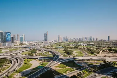 an aerial view of a city with roads and buildings at Blueground JLT pool gym nr Marina JBR DXB-1616 in Dubai