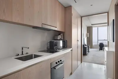 a kitchen with a sink and a microwave at Blueground The Palm Jumeirah jacuzzi nr Atlantis DXB-1708 in Dubai
