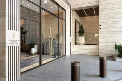 a store front with glass doors with a mannequin in the window at Blueground The Palm Jumeirah pool nr Atlantis DXB-1717 in Dubai