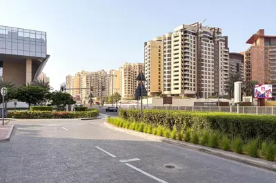 an empty street in a city with tall buildings at Blueground The Palm Jumeirah pool nr Atlantis DXB-1717 in Dubai