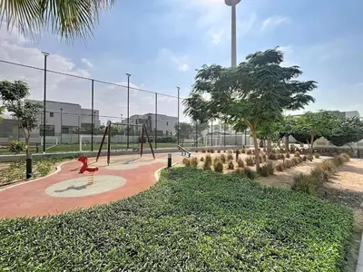 a park with a playground with swings and trees at Locations l Spectacular 4 Bed Villa l Garden l Wadi Al Safa in Dubai