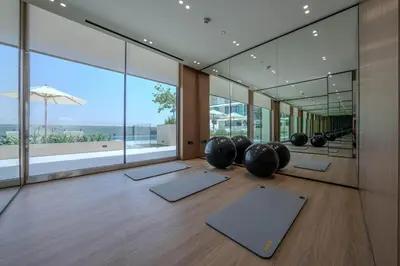 an empty room with yoga mats on the floor at Elegant 1BR Unit with Premium Finish in Dubai