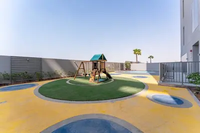 a playground in the middle of a building at 1BDR near Circle Mall with Sauna, Jaccuzzi and Gym in Dubai