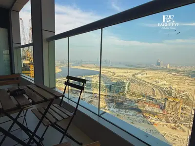 a view of a city from an office window at EagleEye Paramount Tower D 1BR Sleeps 4 in Dubai