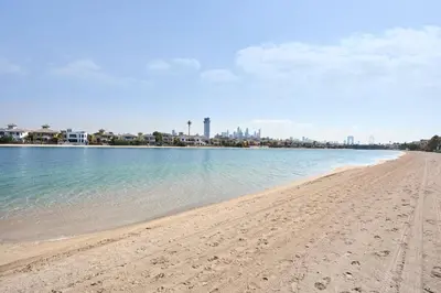 a view of a beach with a city in the background at JuliusHomes-Villa Noor in Dubai