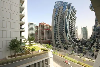 a view of a city with tall buildings and a street at Silk Valley - Luxury DAMAC Studio near Dubai Mall & Burj Khalifa in Dubai